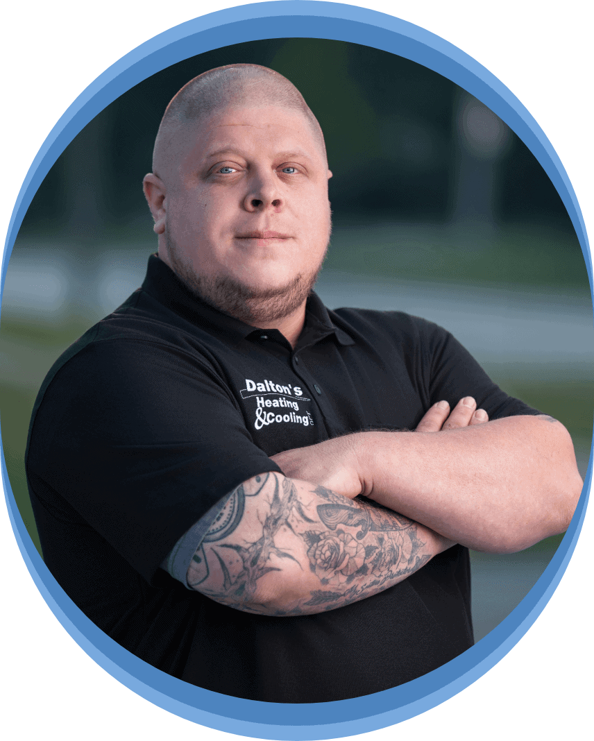 Dalton's Heating and Cooling owner in front of service van.